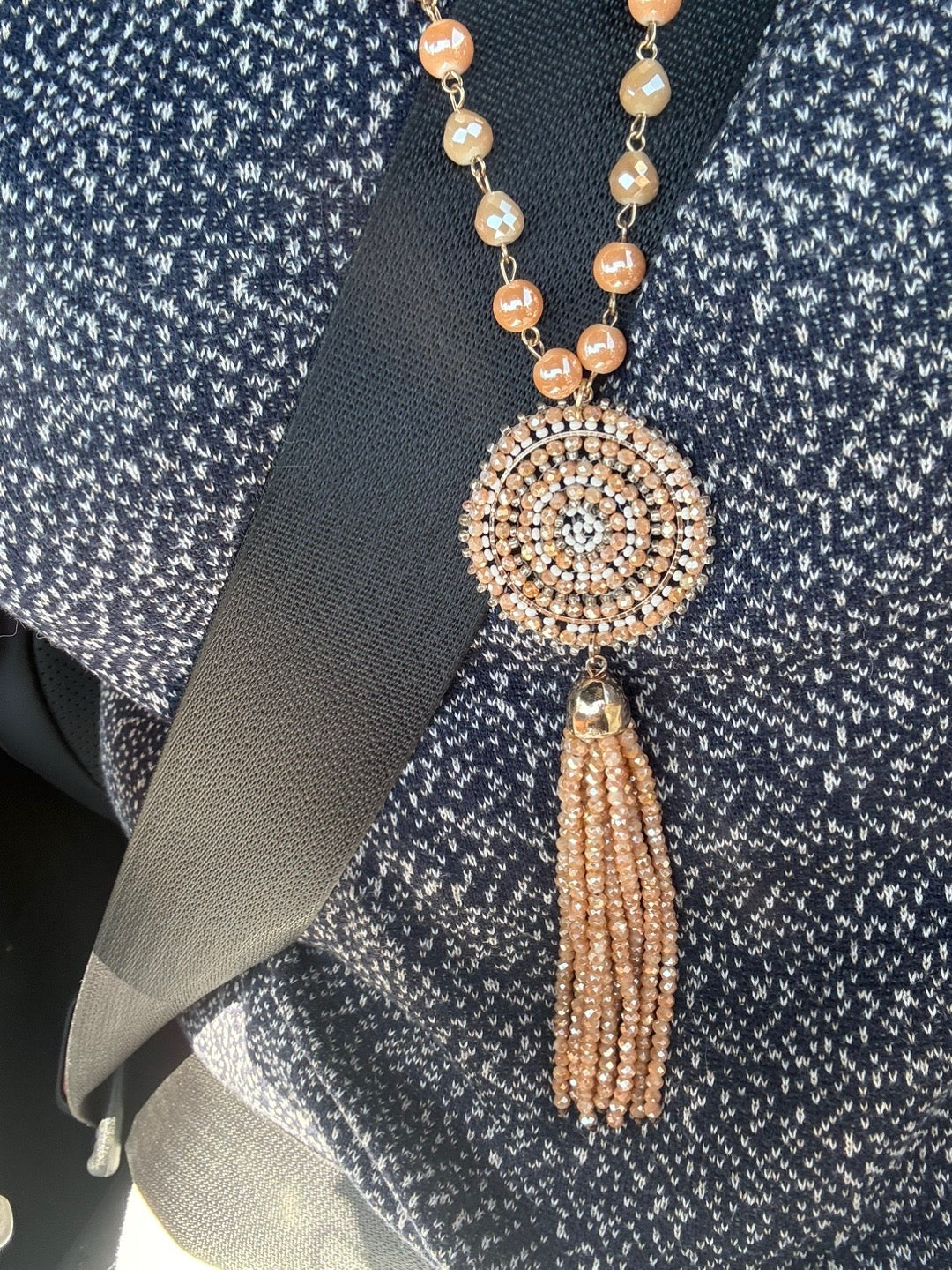 Coral needed tassel necklace