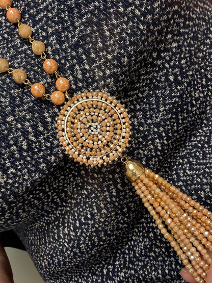 Coral needed tassel necklace
